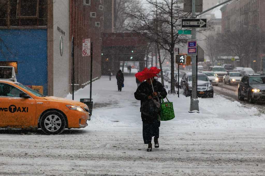 Upper East Side, Manhattan covered in snow, New York City by Guney Cuceloglu