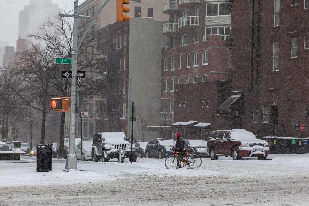 Upper East Side, Manhattan covered in snow, New York City by Guney Cuceloglu