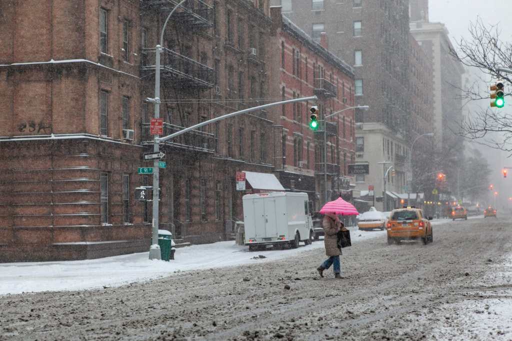 Upper East Side, Manhattan covered in snow, New York City by Guney Cuceloglu