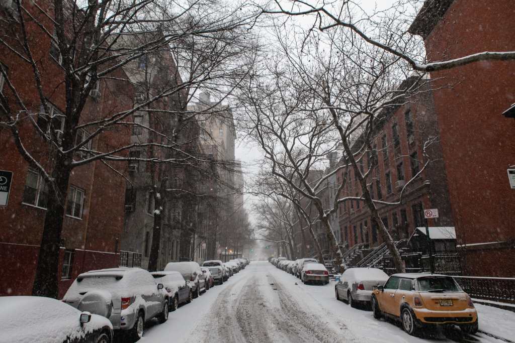 Upper East Side, Manhattan covered in snow, New York City by Guney Cuceloglu