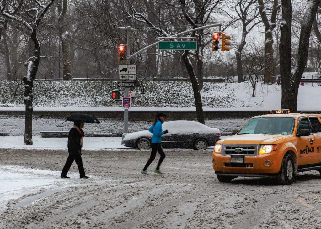 Upper East Side, Manhattan covered in snow, New York City by Guney Cuceloglu