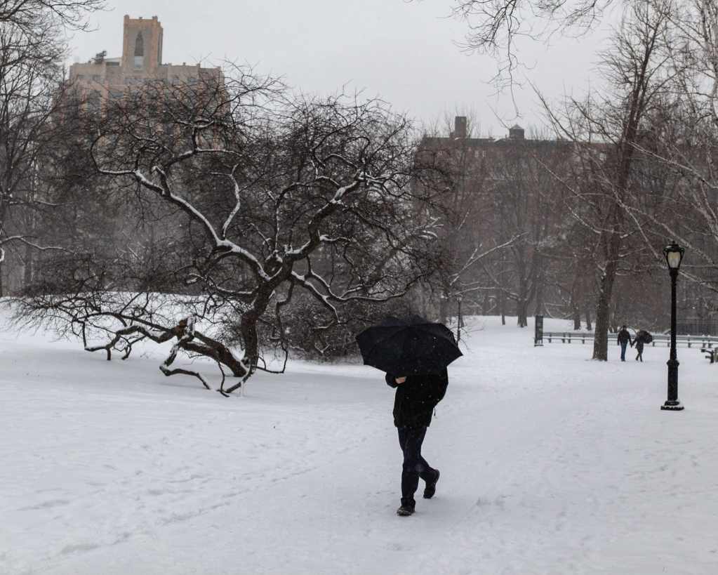 Upper East Side, Manhattan covered in snow, New York City by Guney Cuceloglu