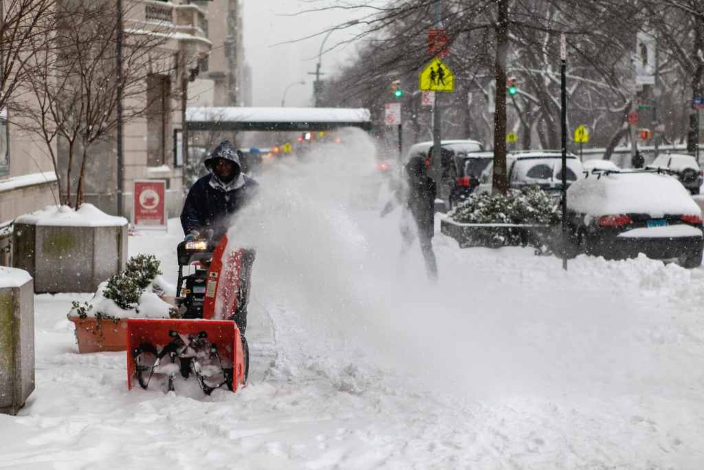 Upper East Side, Manhattan covered in snow, New York City by Guney Cuceloglu